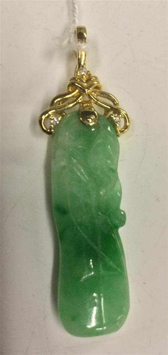 An 18ct gold mounted and diamond set jadeite pendant,